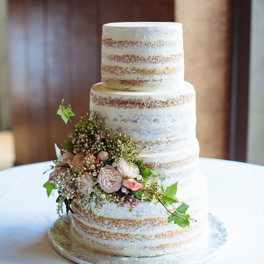 simple naked wedding cake with 4 tiers