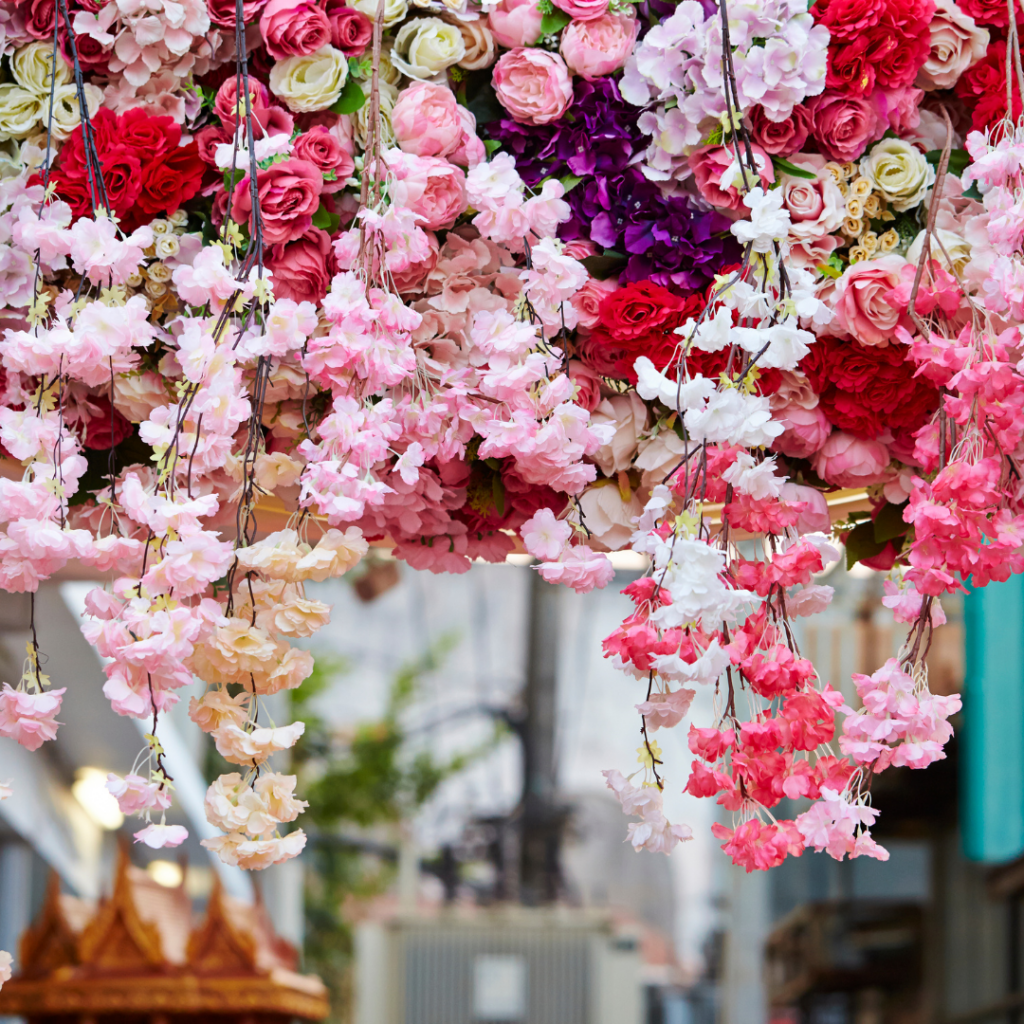 pink flower installation hanging from the ceiling