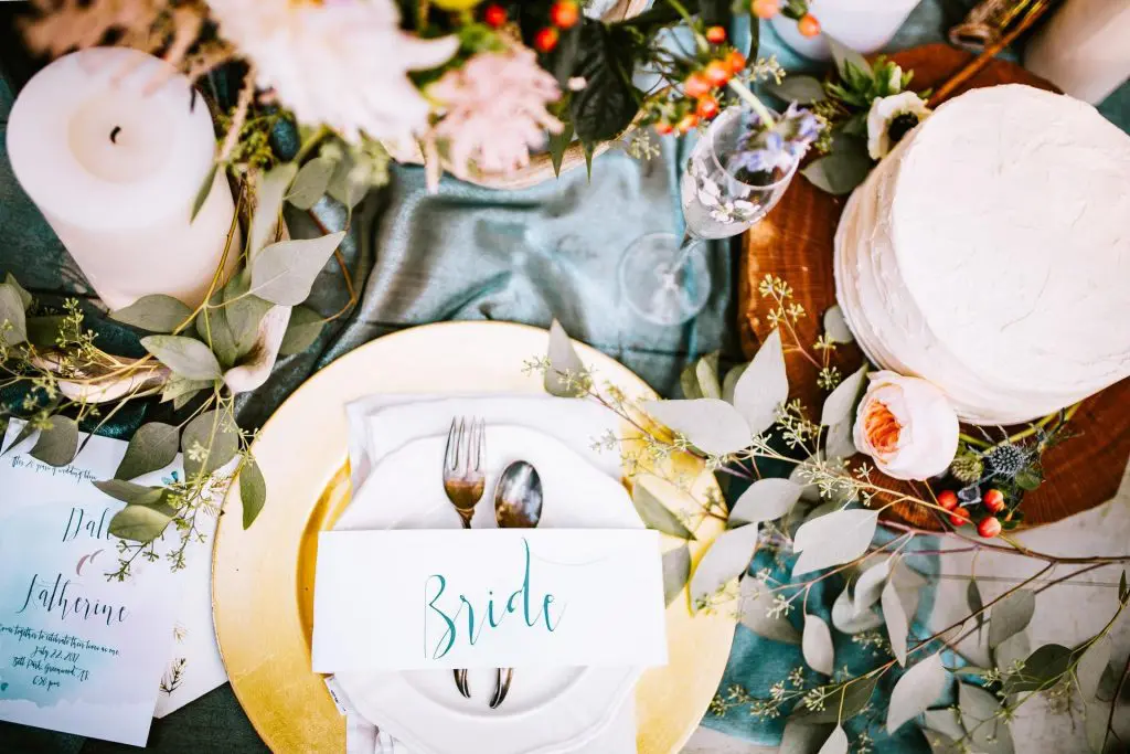 Table with various wedding decorations on it