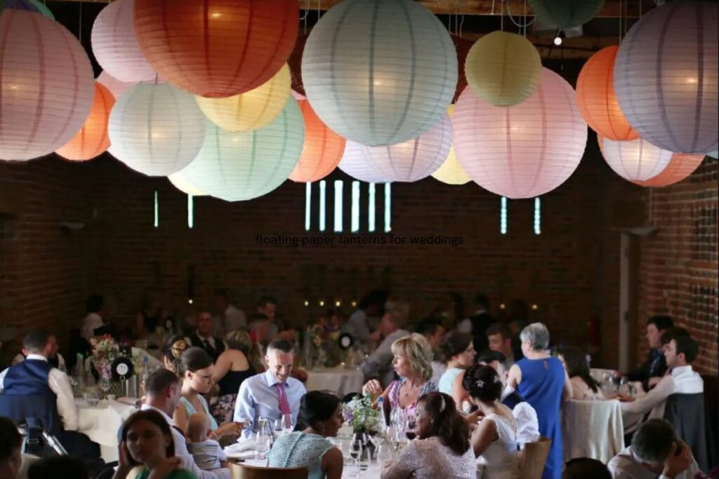 bright colourful hanging paper lanterns at a wedding