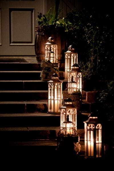 lanterns decorating stairs for a winter wedding lighting idea. 