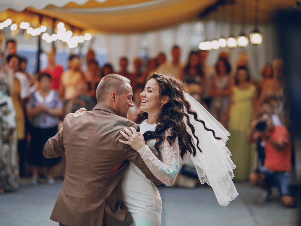 wedding couple dancing during the day 